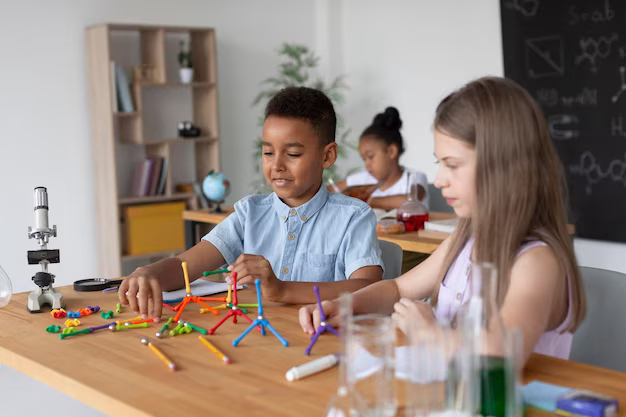 Children playing at the table