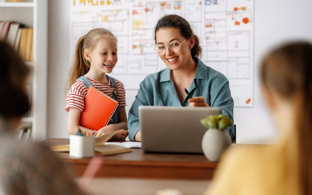 Children and teacher at school